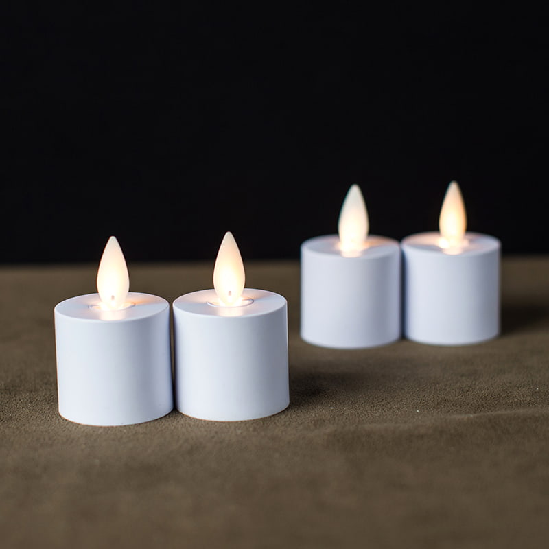 Paquete de 4 velas blancas recargables inductivas sin llama